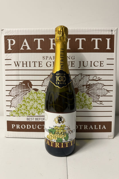 Patritti sparkling white grape juice bottle with packaging in the background